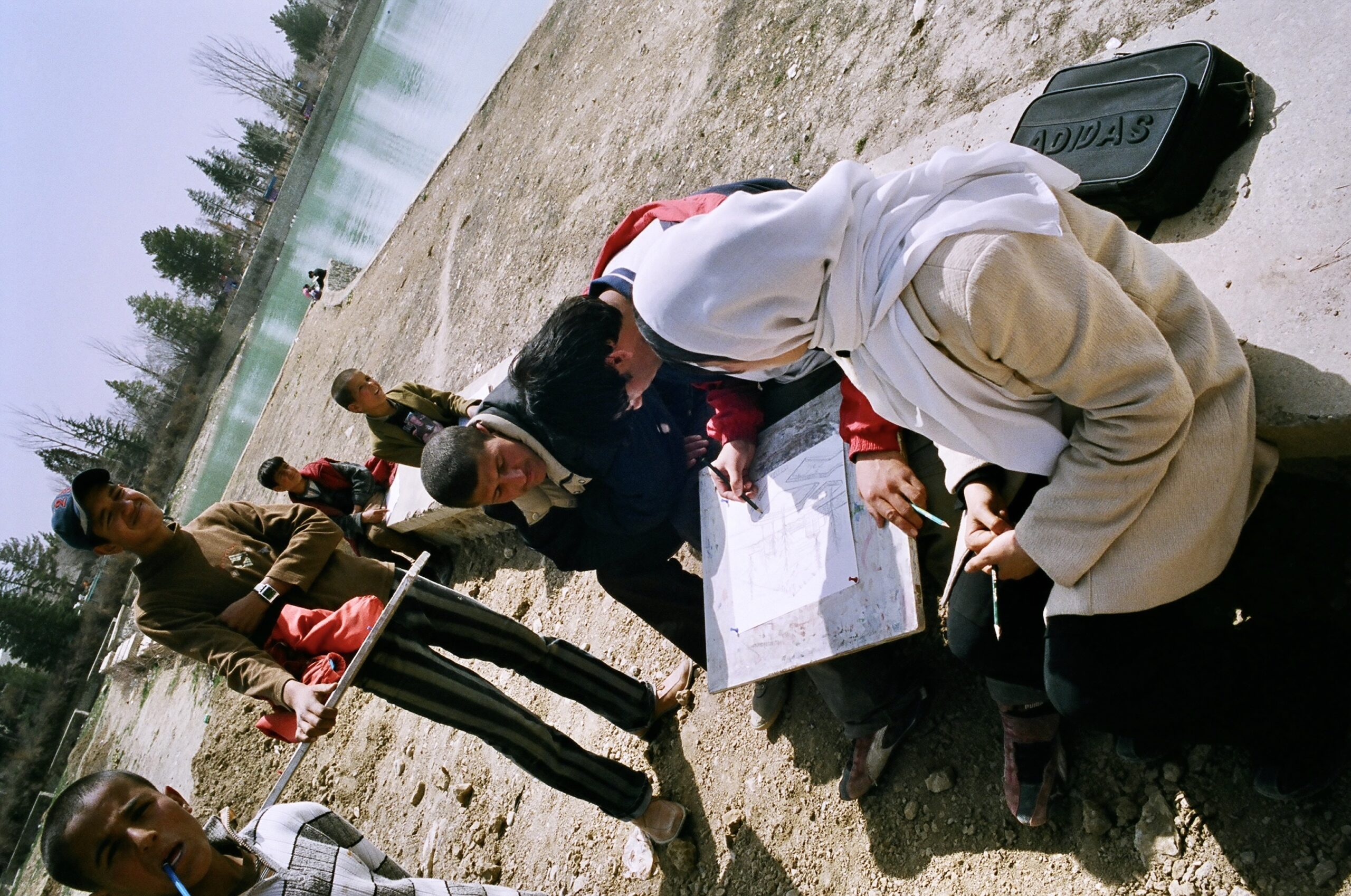 Afghan art students take a a field trip to Bande Qargha.